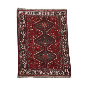Subtiel vintage oosters vloerkleed met onder andere rode en grijze kleuren 186x119cm