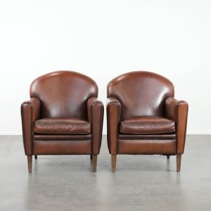 Set van 2 mooi gevormde schapenleren art deco design fauteuils met tijdloze en warme kleuren