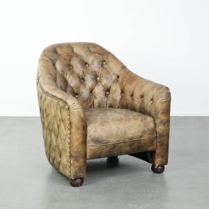 Unieke, stoere en comfortabele rundleren chesterfield clubfauteuil met een mooie kleurencombinatie