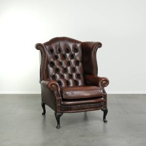 Rundleren chesterfield oorfauteuil in Engelse stijl met een charmante uitstraling