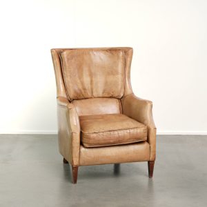 Vintage schapenleren armchair in een licht bruine kleur met een comfortabele zit