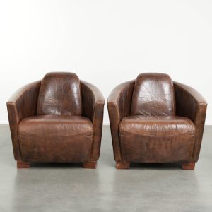 Set van 2 rundleren Aviator design armchairs in een warme bruine kleur met een mooi patina